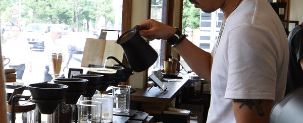 KINTO Journal Article Barista using POUR OVER KETTLE to brew coffee 